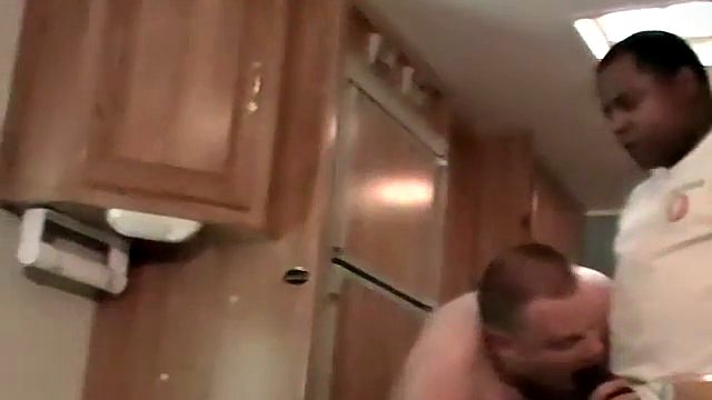 Interracial dick sucking with a horny ebony gay