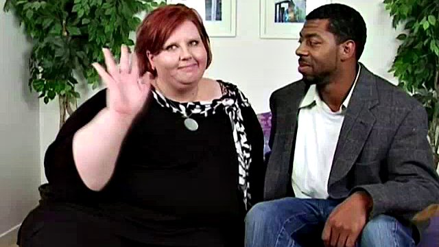 Fat redhead seduces a black man