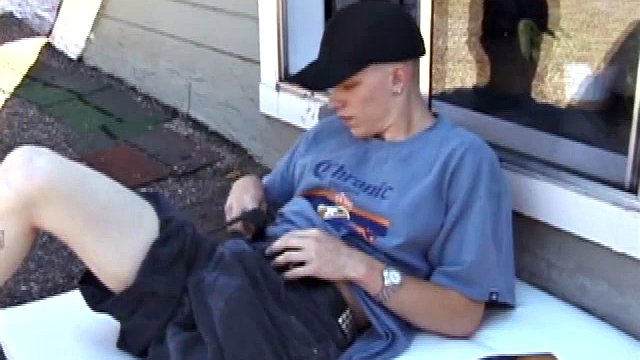 We find Shane on the roof enjoying a beautiful day, oblivious to the sounds of traffic on the streets below. He soon unzips and unzips, letting his eager erection protrude through the fly of his boxers.