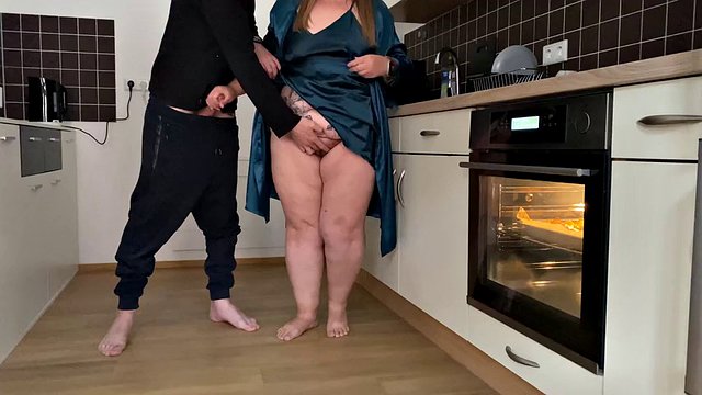 Horny mother-in-law and son-in-law masturbate together in the kitchen