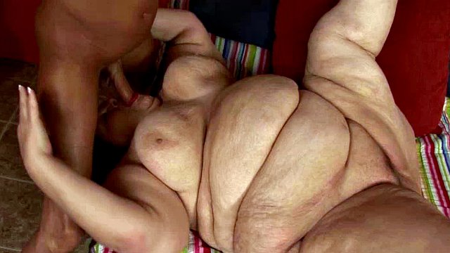 Mature BBW gets her tits fucked