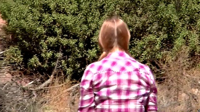 Plump redhead fucked outdoors on the ranch