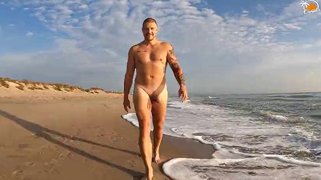 Real couple having fun at the nude beach. Sexy wet blowjob
