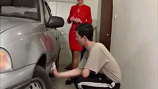 Busty mom seduces her stepson while she cleans the car
