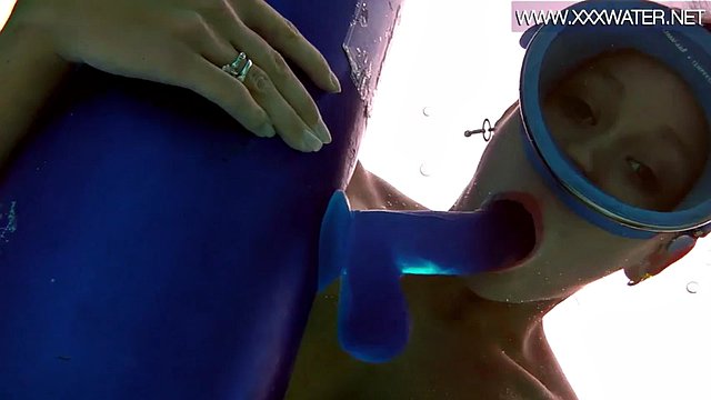 Hungarian beauty fucks a dildo underwater