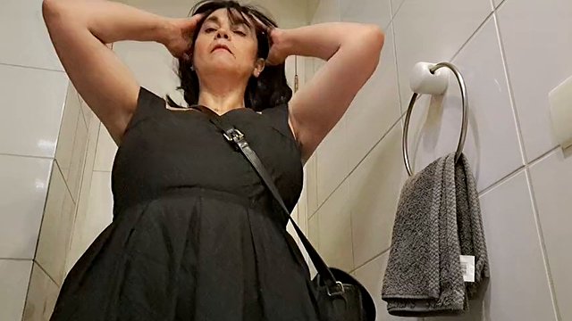 Sexy stepmom masturbates in the bathroom