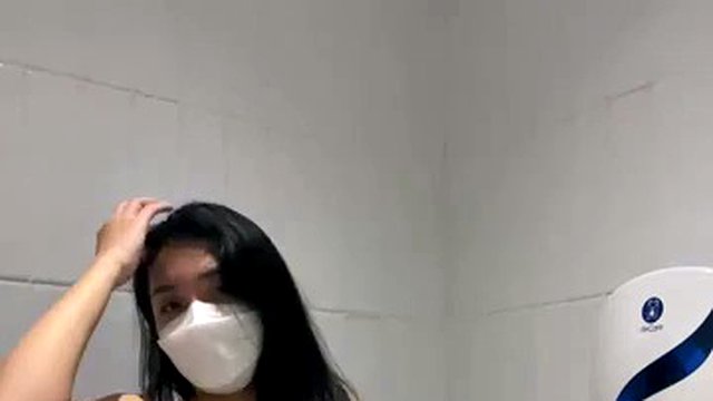 Vietnamese babe masturbates to cum in public toilet