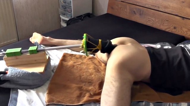 Anal fucking machine with a long dildo