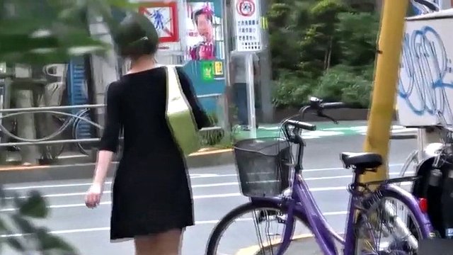 Nasty japanese babe caught while taking a pee in public