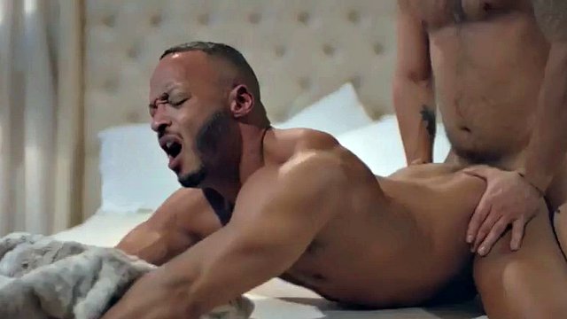 Bottom BBC bareback by inked stud doggystyle on bed
