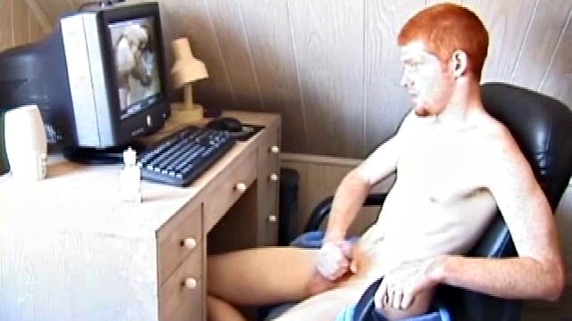 Sitting naked in front of a computer, Tristian lubricates his cock and starts masturbating, while watching some porn. After showing us his cute little ass and stroking himself to the brim, Tristian shoots his hot sticky cum on the computer screen..