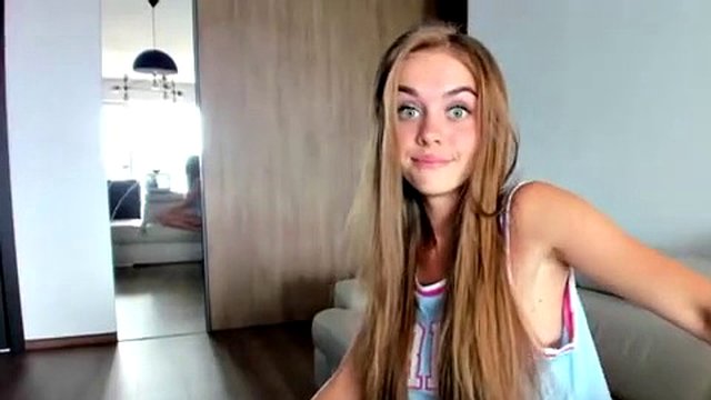 Cute amateur teen playing solo on webcam