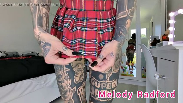 Trying on a short black and red skirt in lingerie close-up Melody Radford Onlyfans
