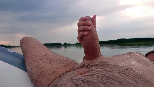 My wife jerks off my dick with a happy ending in the inflatable boat on the lake