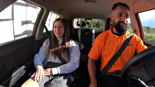Doggystyled driving student enjoys class