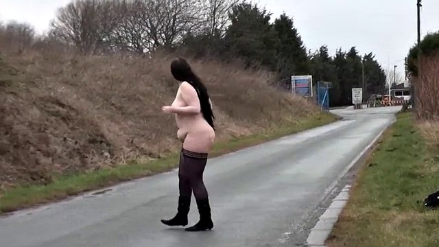 Ugly fat slut walking naked on a public road
