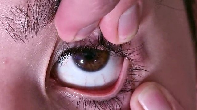 Cum container gets full cumshot in her open eye while talking