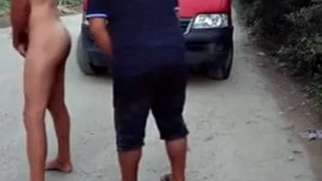 Young naked slut offers herself to strangers on the street