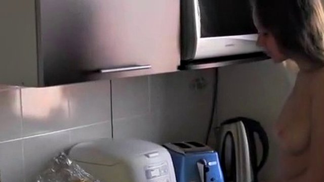 Naked girl sucking and cooking