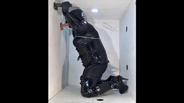 Glory hole fetish slut in boots and PVC services many hard rubber cocks