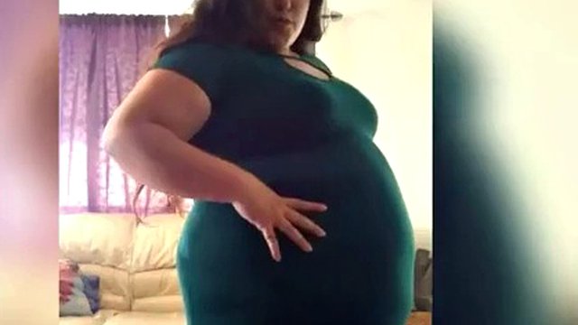 Fat bellied BBW tries on clothes