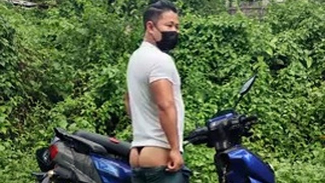 Wet and rainy masturbating in shorts and undressing near the road in a scooter near the women's police station. Nervous cock