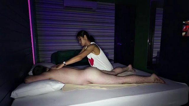 Asian amateur teen gives her client a massage with a very happy ending